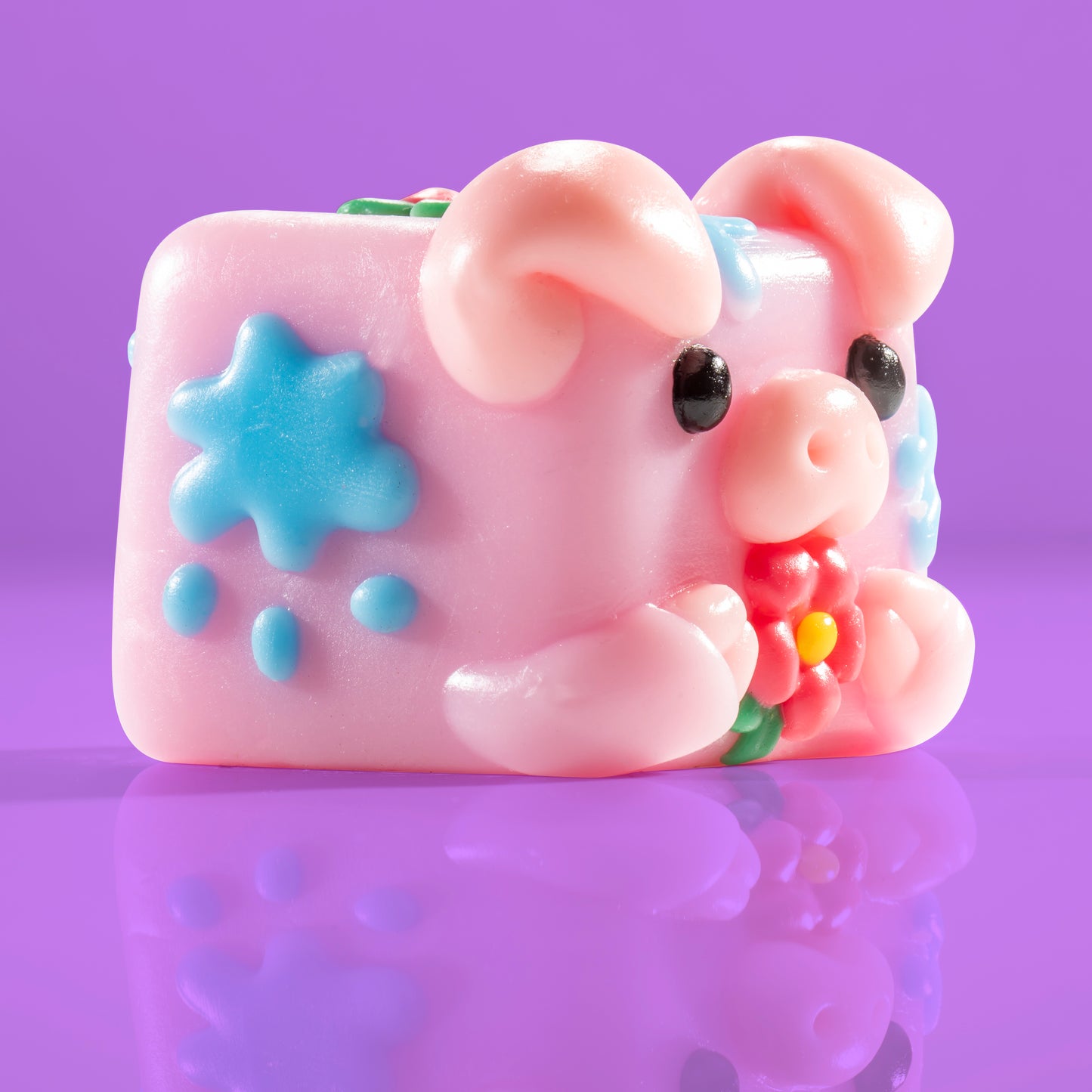 Bubbles the pig Mushykinz taba squishy right side view on a purple background