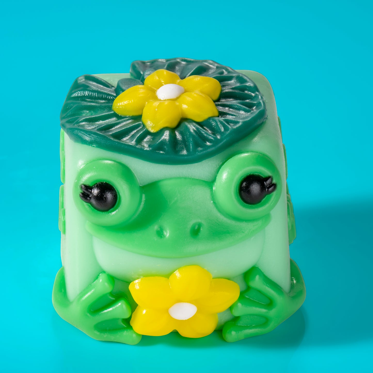 Lily the frog Mushykinz taba squishy top front view on a blue background