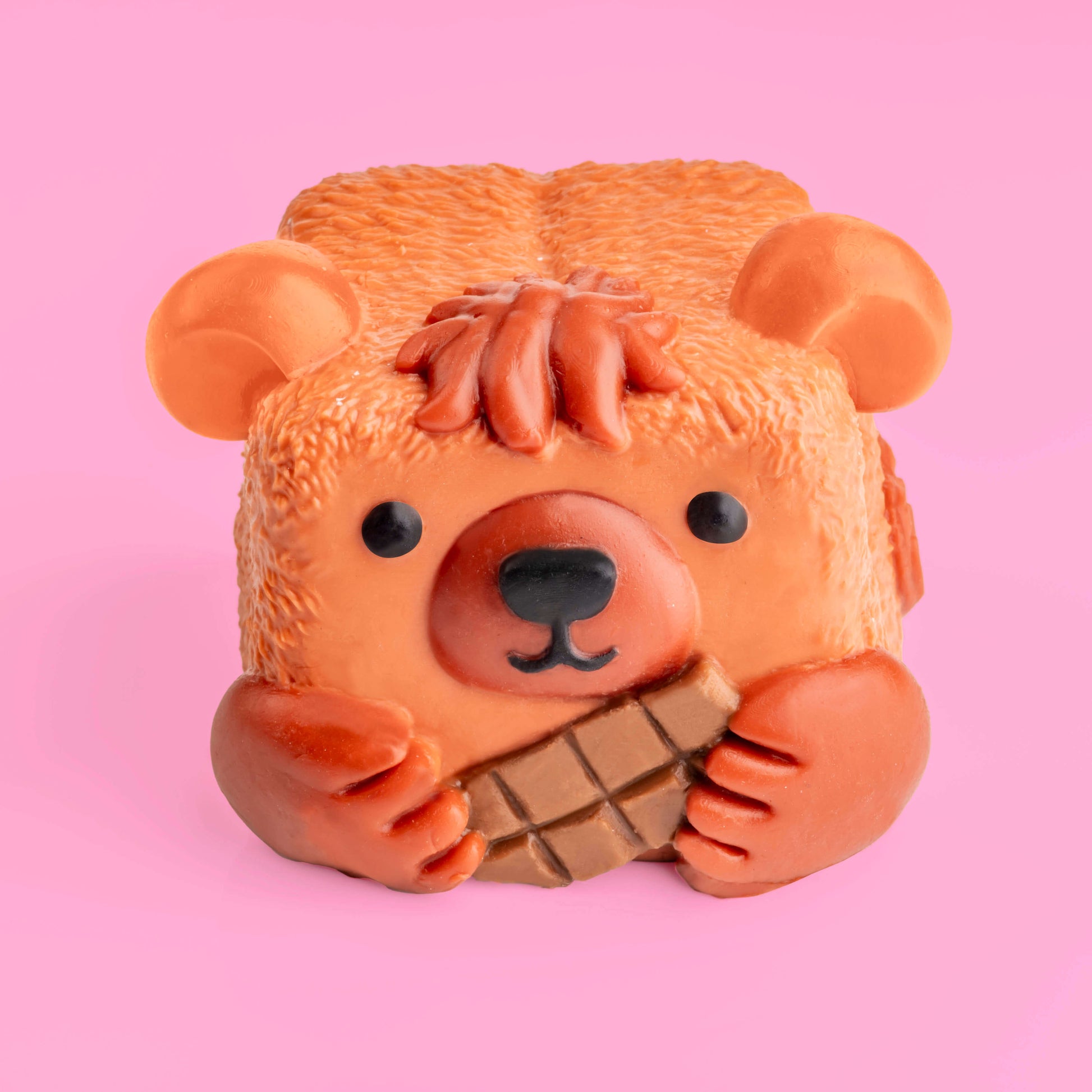 Button the Bear Mushykinz taba squishy top front view on a pink background