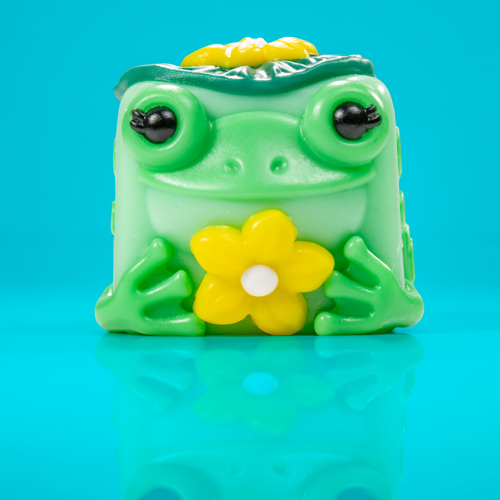 Lily the frog Mushykinz taba squishy front view on a blue background